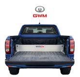 Blue GWM pickup truck with TubDivider
