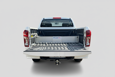 Back view of a white pickup truck with a TubDivider