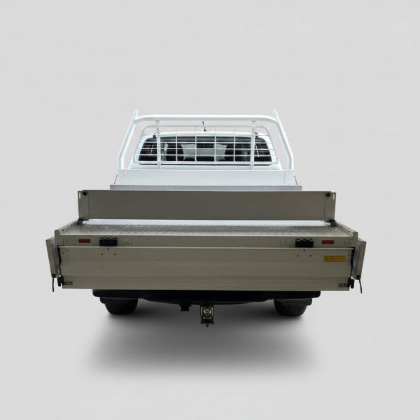 Rear view of a ute tray with an aluminium
divider fitted across it