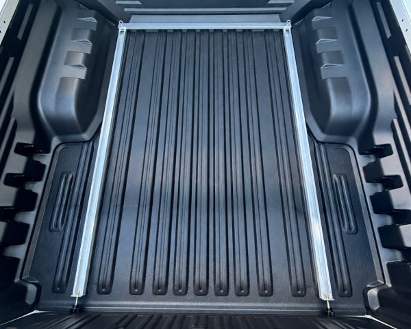 Top view of 2026 Toyota HiLux tub with DivideUte Drop-In slider base