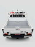 White truck bed with 'Divide Ute' branding and text on a white background