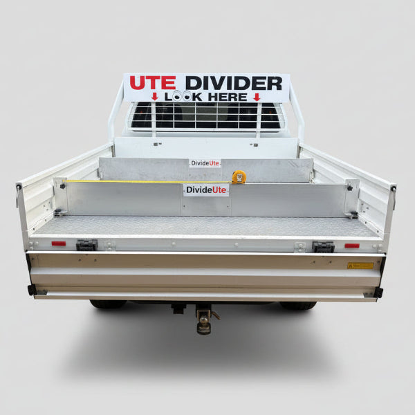 Tray divider fitted across a ute tray with
marked setup points